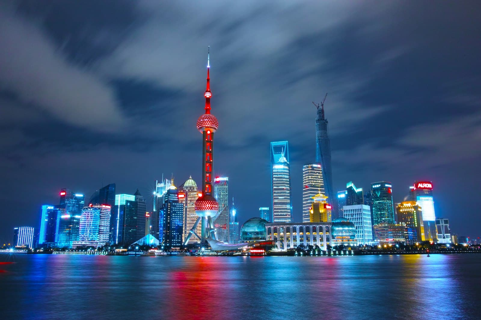 Shanghai Pudong skyline lit up at night viewed from the Bund